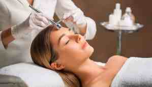 Woman relaxing during a HydraFacial session
